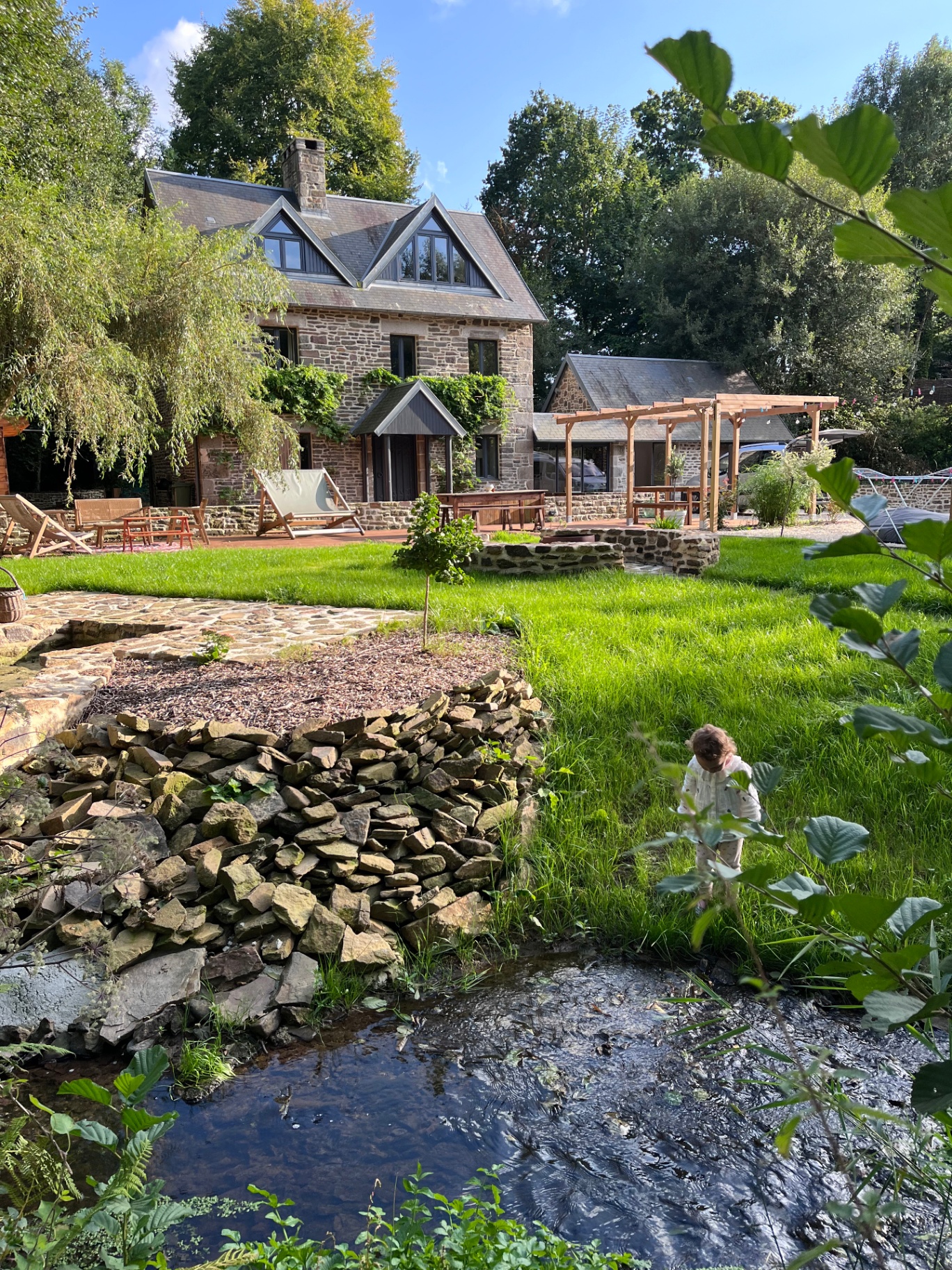 The stream beside the house